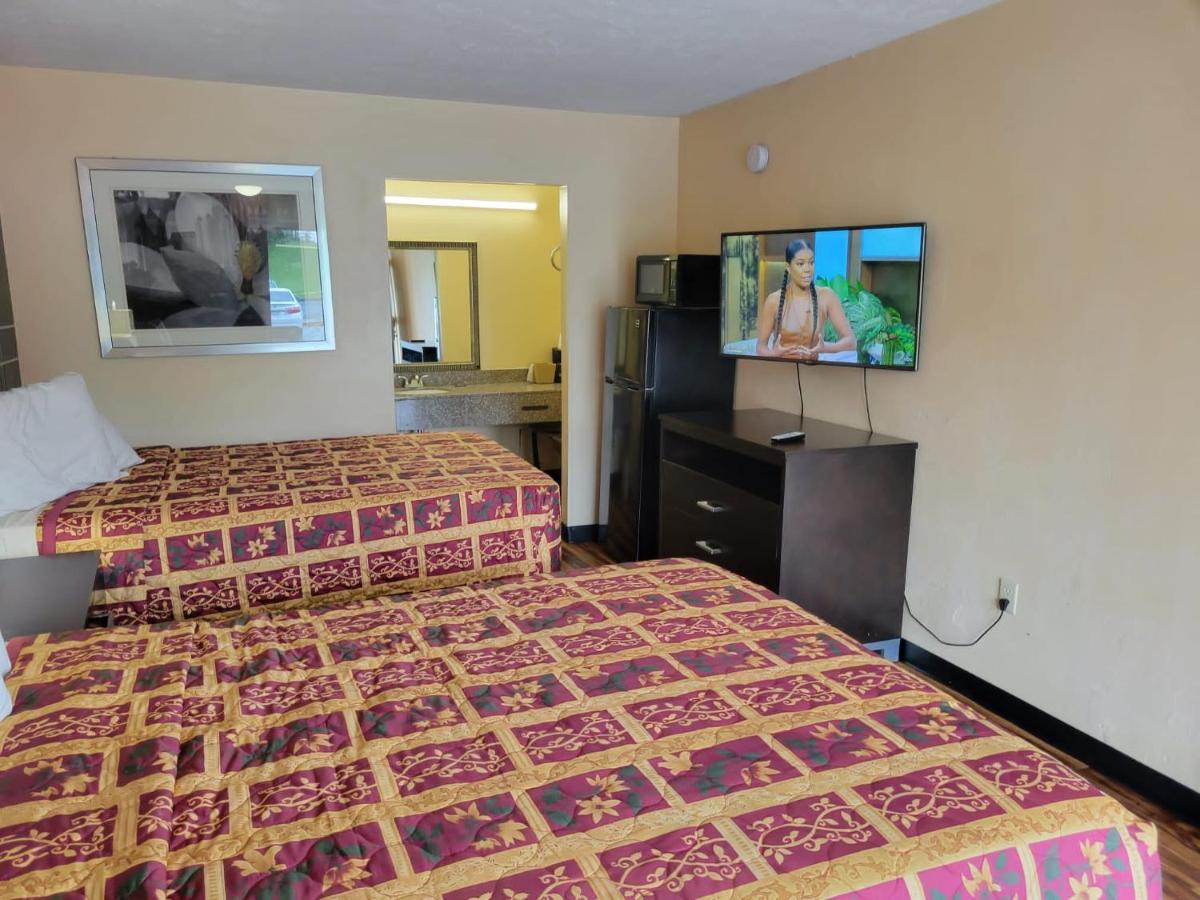 Country Hearth Inn & Suites Картерсвилл Экстерьер фото